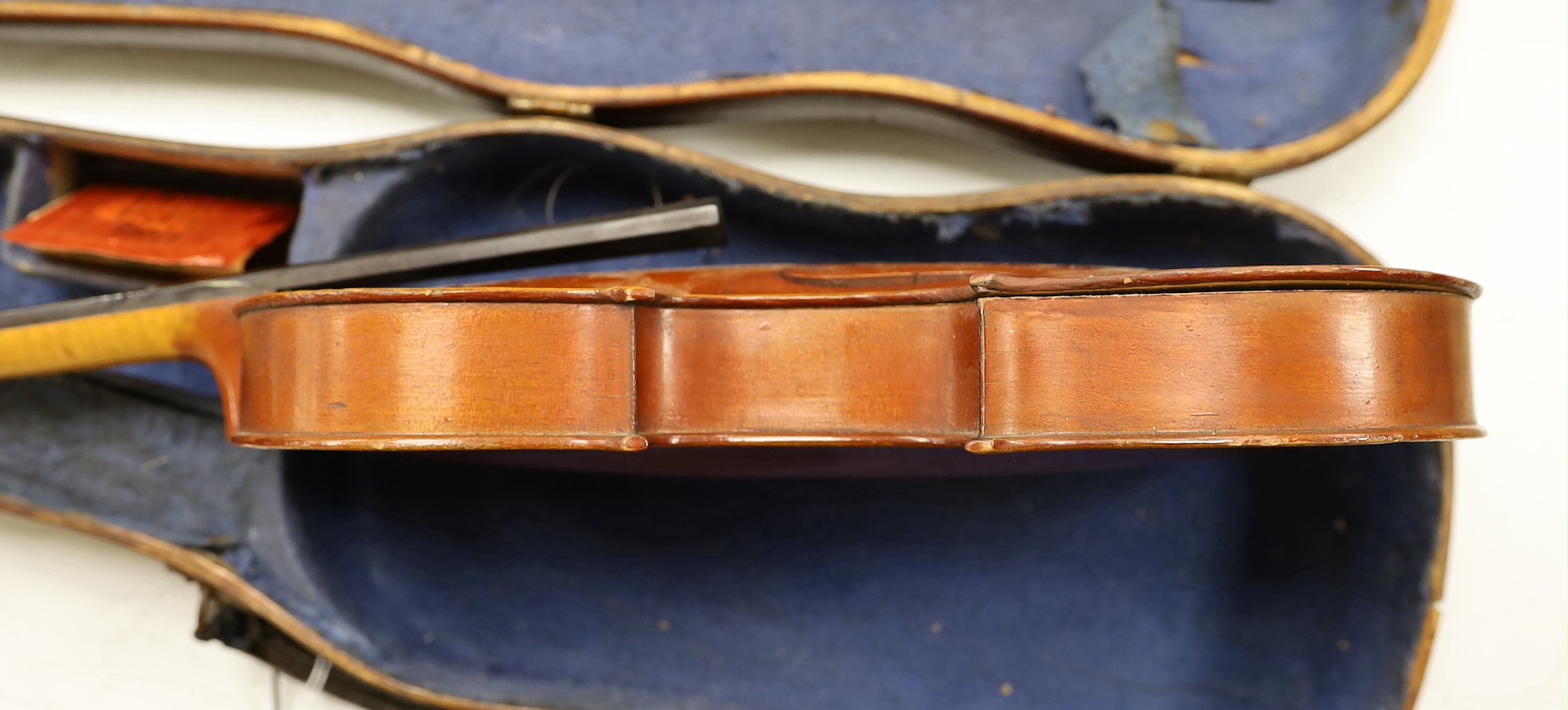 A 3/4 size violin, length of back 33cm, wooden case